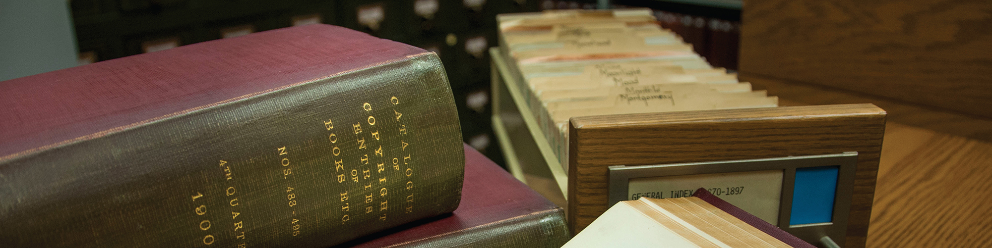 Stacked books and card catalog