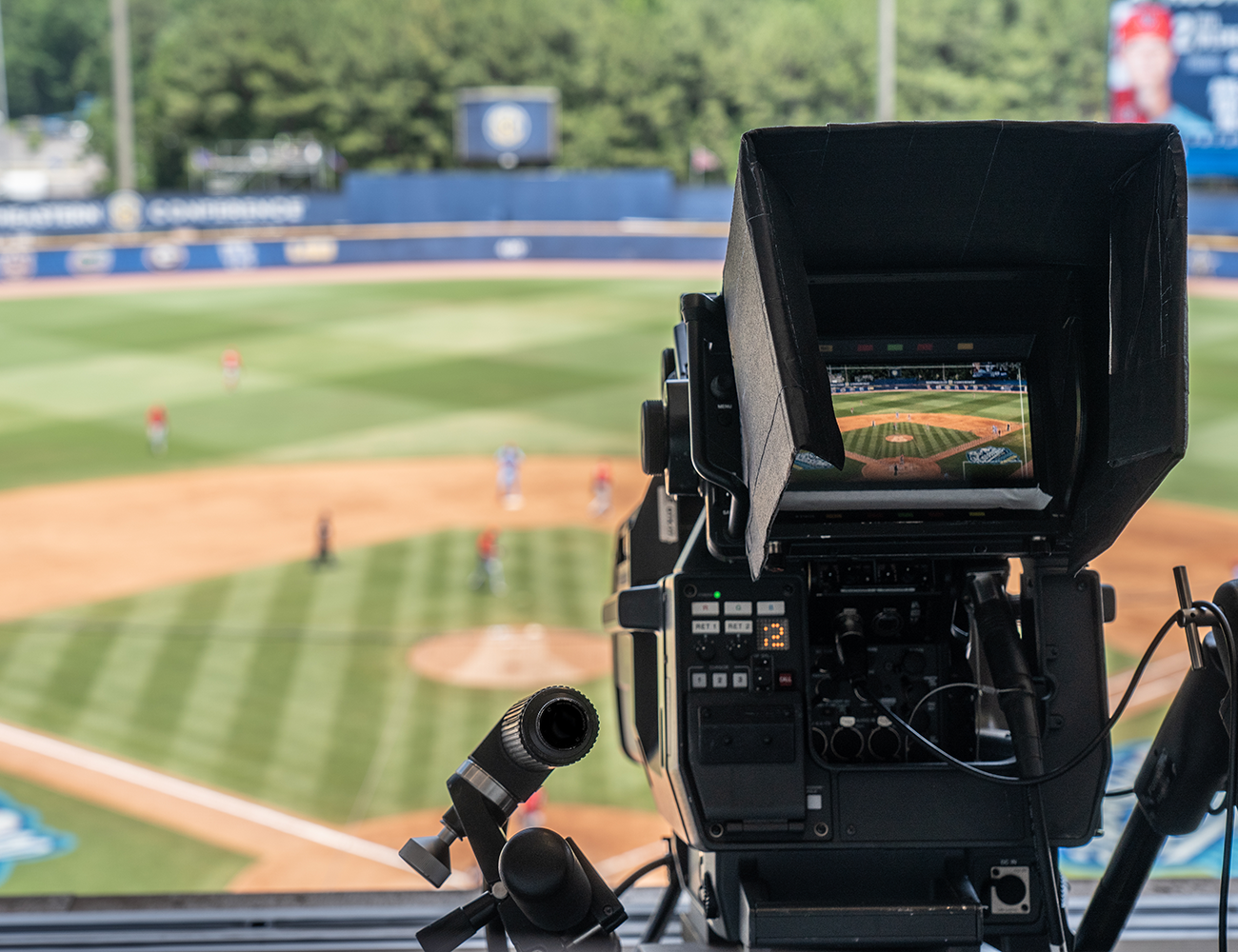 Video camera recording baseball game