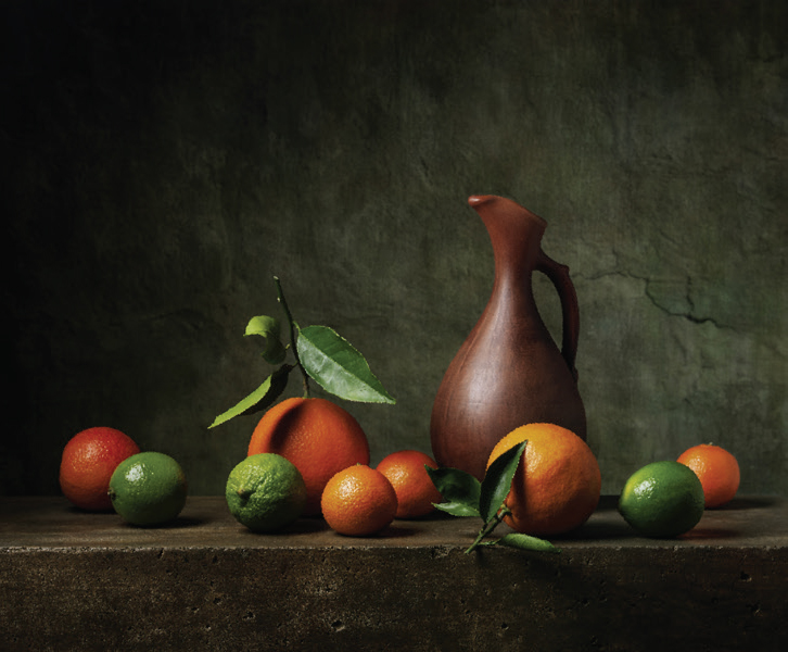 Image of a pitcher and fruit